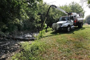 A crew from the Urban County Division of Water Quality ?worked Monday to clean up sewage in Vaughns Branch, a tributary of Wolf Run Creek. The leak occurred where an 8-inch sewer line crosses the creek. | Kentucky.com