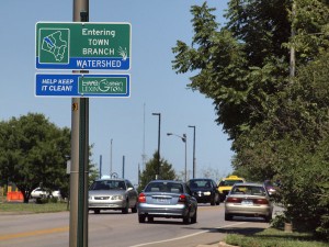 One of the first watershed signs to be posted around Lexington designates the entrance to the Town Branch watershed on Red Mile Road. There are nine watersheds in Fayette County. | Kentucky.com